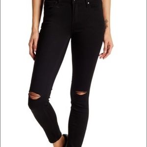 Black articles of society ripped knee denim jeans